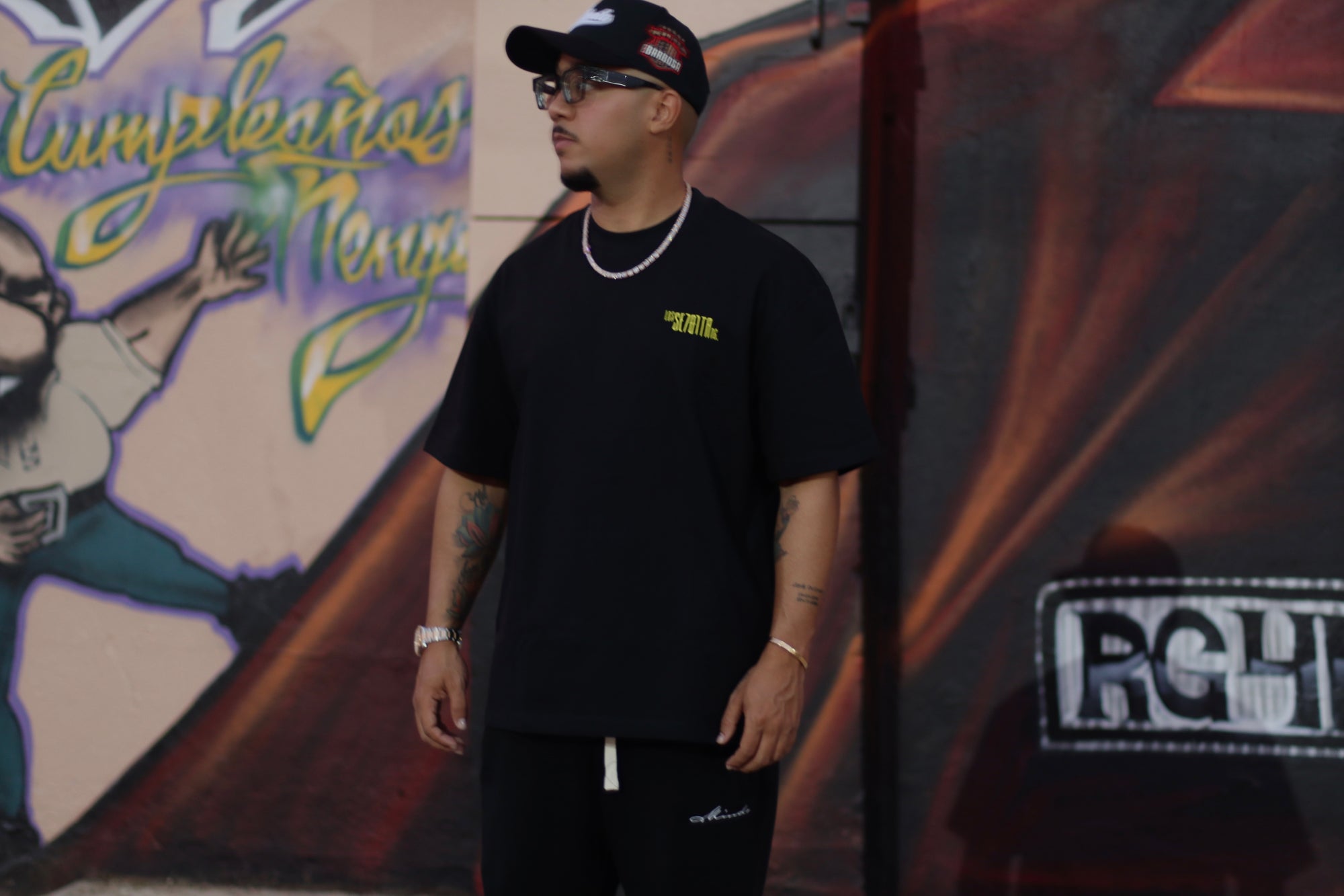 Black t-shirt with yellow logo