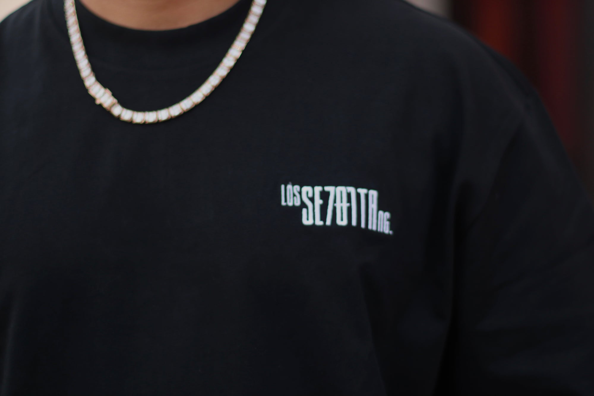 Black t-shirt with white logo