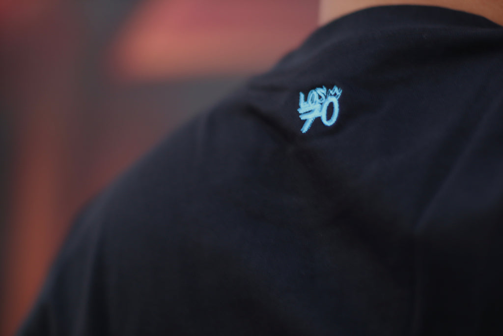 Black t-shirt with blue logo